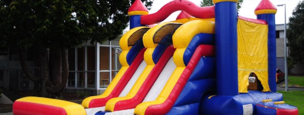 Are there any safety certifications or standards that the inflatable bounce houses comply with?