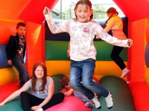 How many children may play on one bounce house?